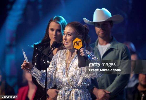 Maddie Font accepts the Duo/Group Video of the Year award for ‘Woman You Got’ from Gabby Barrett and Dustin Lynch at the 2022 CMT Music Awards at...