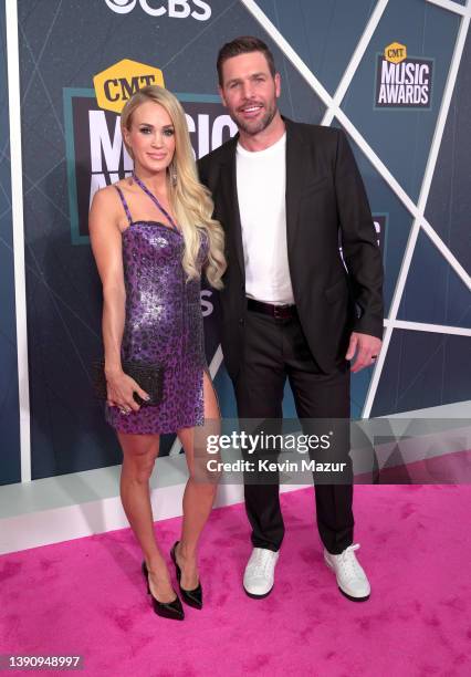 Carrie Underwood and Mike Fisher attend the 2022 CMT Music Awards at Nashville Municipal Auditorium on April 11, 2022 in Nashville, Tennessee.