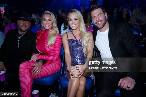 Jason Aldean, Brittany Aldean, Carrie Underwood, and Mike Fisher attend the 2022 CMT Music Awards at Nashville Municipal Auditorium on April 11, 2022...