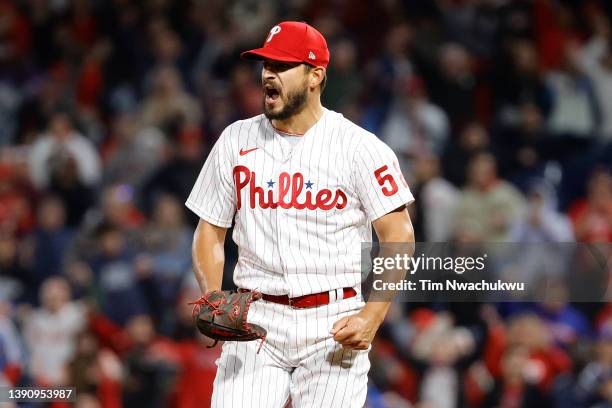 Brad Hand of the Philadelphia Phillies celebrates after defeating the New York Mets at Citizens Bank Park on April 11, 2022 in Philadelphia,...