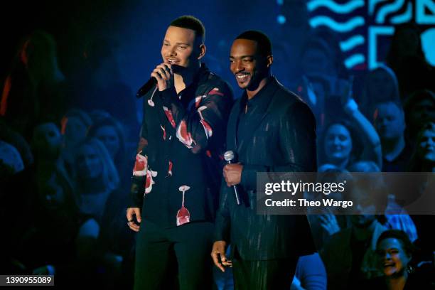 Kane Brown and Anthony Mackie host onstage at the 2022 CMT Music Awards at Nashville Municipal Auditorium on April 11, 2022 in Nashville, Tennessee.