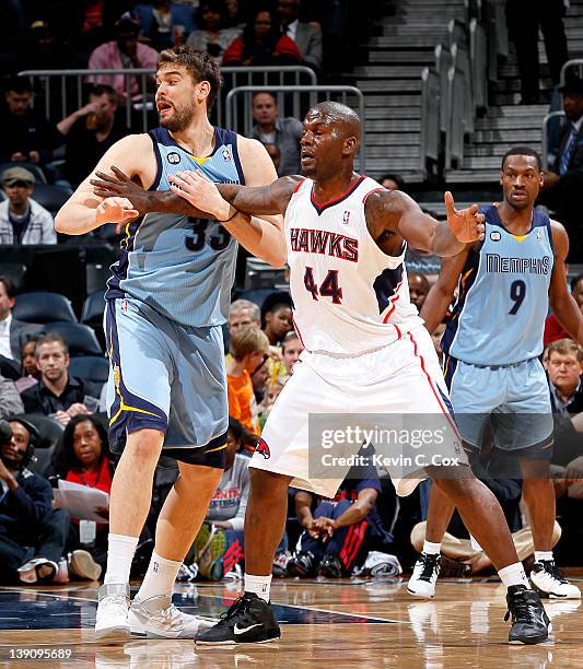 Marc Gasol of the Memphis Grizzlies against Ivan Johnson of the Atlanta Hawks at Philips Arena on February 2, 2012 in Atlanta, Georgia. NOTE TO USER:...