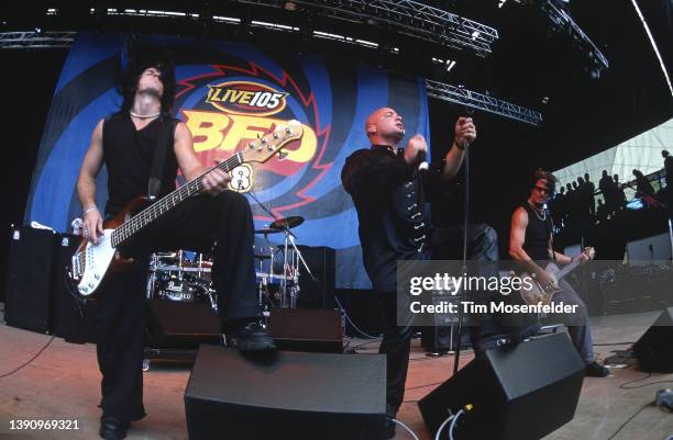 Steve "Fuzz" Kmak, David Draiman, and Dan Donegan of Disturbed perform during Live 105's BFD at Shoreline Amphitheatre on June 15, 2001 in Mountain...