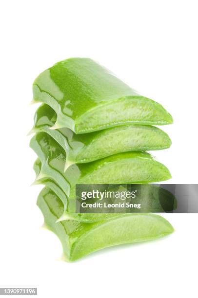 stack of sliced aloe vera leaf on white background isolated - aloe slices stock pictures, royalty-free photos & images