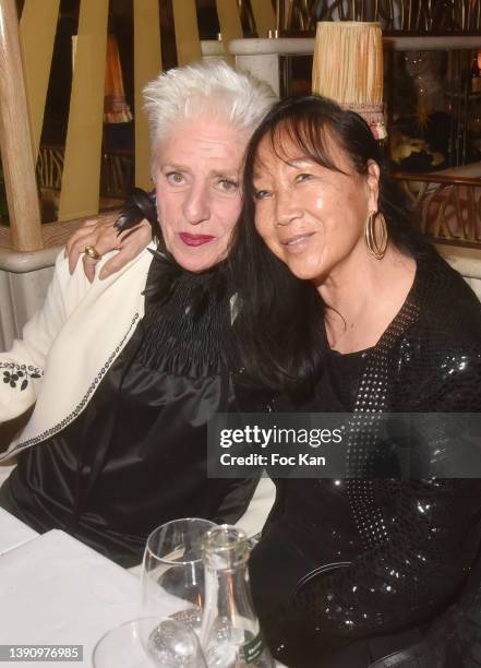 Catherine Euvrard and Mei Chen Chalais attend Princesse Murat’s Auction Dinner at Les Jardins de Presbourg on April 11, 2022 in Paris, France. (