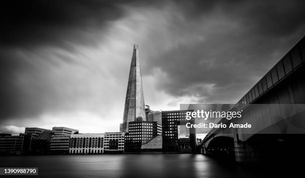 the shad building view from across thames river - shad stock pictures, royalty-free photos & images