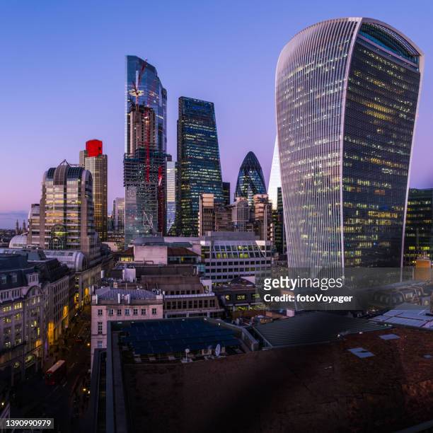 city of london futuristic skyscrapers twinkling dusk over financial district - central london stock pictures, royalty-free photos & images