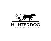 hunter dog showing ready to attack pose as logo