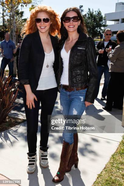 Rachelle Lefevre and Emmanuelle Vaugier attend the Best Friends Animal Society pet adoption and spay and neuter services grand opening at Northeast...