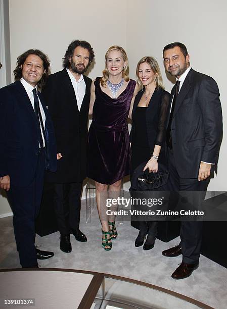 Guido Damiani, Carlo Cracco, Sharon Stone, a guest, Giorgio Damiani attend a cocktail party held at Damiani Flagship store on February 16, 2012 in...