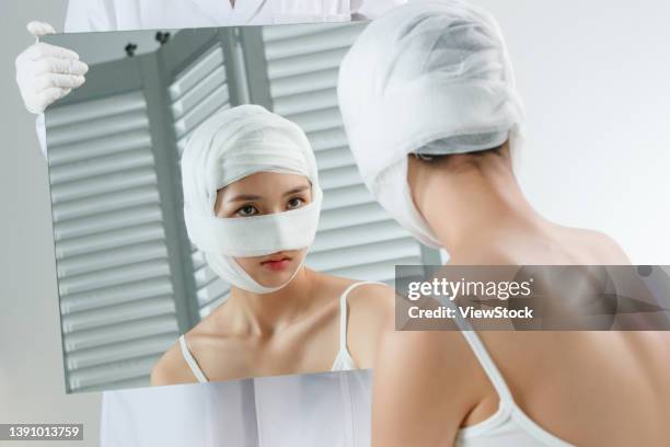 Plastic Young Woman Look In The Mirror, 照片檔