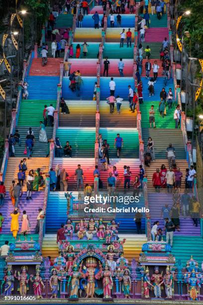 colorful steps all the way to the top of batu caves in kuala lumpur - batu caves stock pictures, royalty-free photos & images
