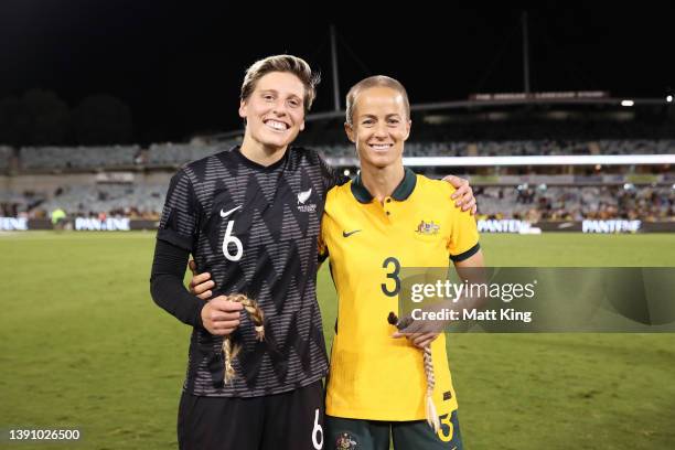 Rebekah Stott of New Zealand and Aivi Luik of Australia pose and Rebekah Stott shaved the head of Aivi Luik during the International womens friendly...