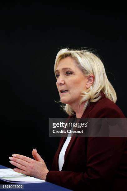 France's far-right party Rassemblement National candidate for the 2022 French presidential election Marine Le Pen speaks to the media during a press...