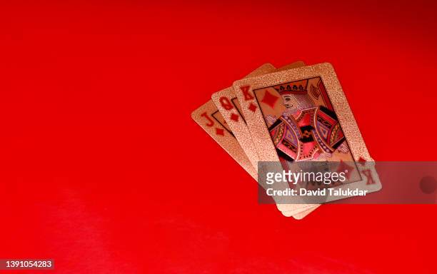 golden colour playing card - klöver nummerkort bildbanksfoton och bilder