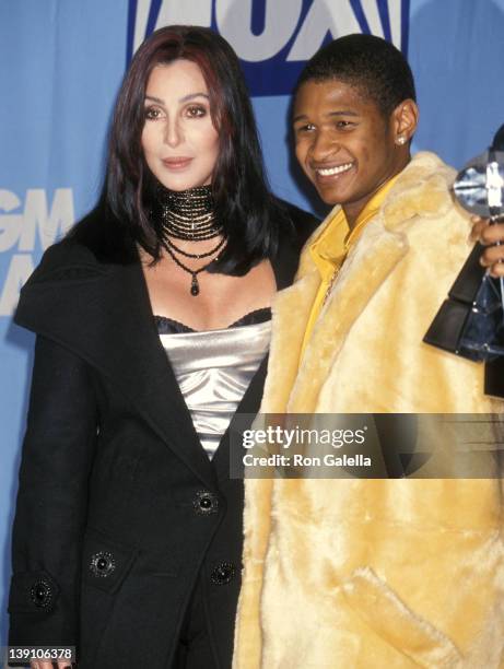 Singer/Actress Cher and singer Usher attend the Ninth Annual Billboard Music Awards on December 7, 1998 at MGM Grand Garden Arena in Las Vegas,...