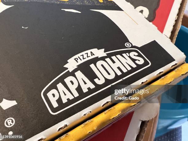 Close-up of logo on corner of box for Papa John's pizza, Pleasant Hill, California, March 27, 2022. Photo courtesy Sftm.