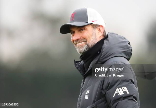 Juergen Klopp, Manager of Liverpool looks on during the Liverpool Training Session ahead of the UEFA Champions League match against Benfica at AXA...