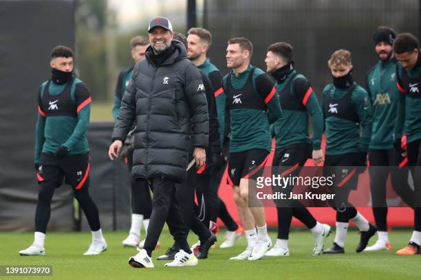 Juergen Klopp, Manager of Liverpool looks on during the Liverpool Training Session ahead of the UEFA Champions League match against Benfica at AXA...