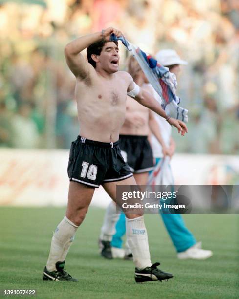 Argentina captain Diego Maradona celebrates after the penalty shoot out during the FIFA 1990 World Cup quarter final match against Yugoslavia at the...