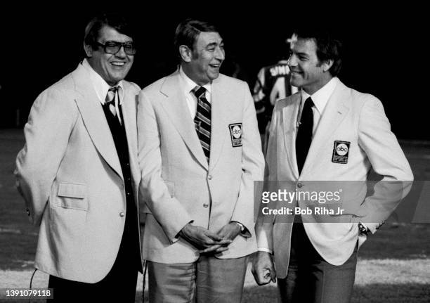 Sports Broadcasters Alex Karras Howard Cosell and Frank Gifford before game action of Los Angeles Rams against Pittsburgh Steelers, December 20, 1975...
