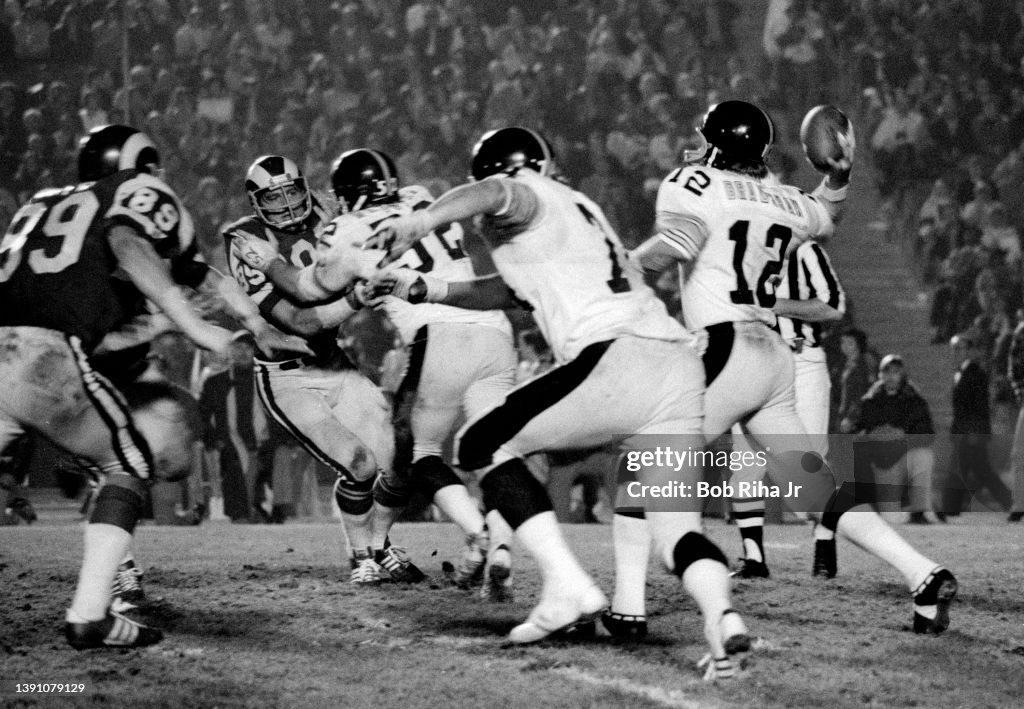 Steelers Quarterback Terry Bradshaw under pressure during Los Angeles Rams vs Pittsburgh Steelers 1975