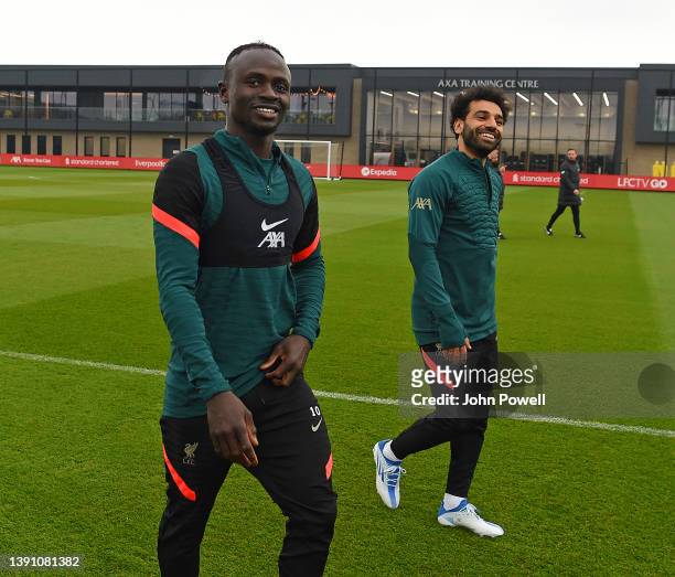 Sadio Mane of Liverpool and Mohamed Salah of Liverpool before a training session at AXA Training Centre on April 12, 2022 in Kirkby, England.