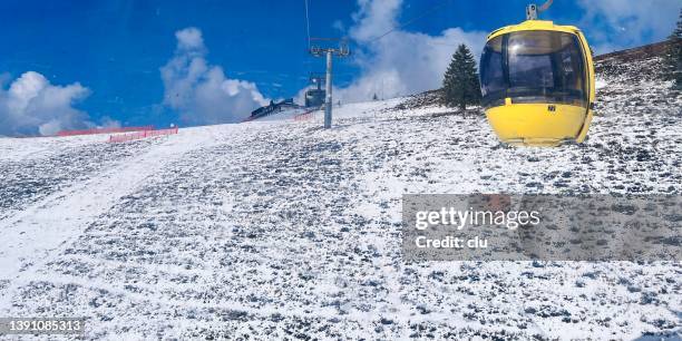 belchen, germany, yellow gondola on the way to the mountain peak - black forest germany stock pictures, royalty-free photos & images