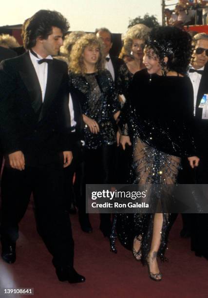 Singer/Actress Cher and boyfriend Rob Camilletti attend the 60th Annual Academy Awards on April 11, 1988 at Shrine Auditorium in Los Angeles,...