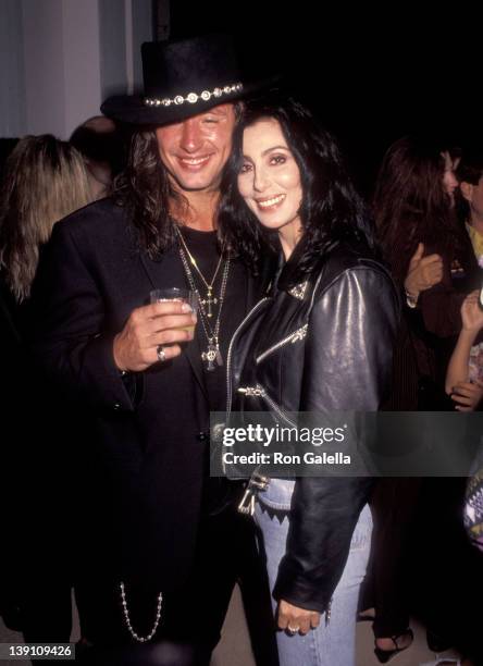 Musician Richie Sambora and singer/actress Cher attend Richie Sambora's "Stranger in This Town" Album Release Party on September 4, 1991 at Griffith...