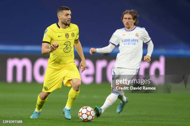 Mateo Kovacic of Chelsea is challenged by Luka Modric of Real Madrid during the UEFA Champions League Quarter Final Leg Two match between Real Madrid...