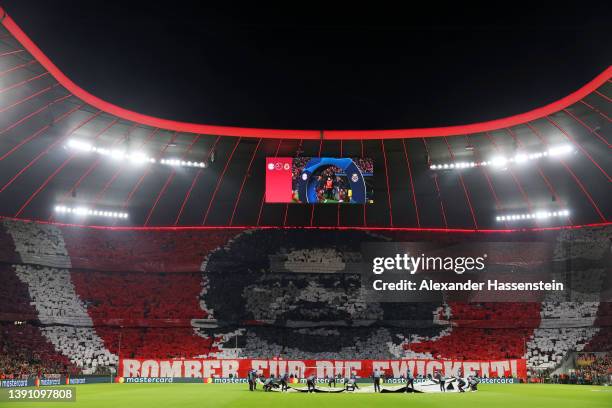 General view inside the stadium as fans display a tifo showing a picture of the deceased striker Gerd Mueller and the lettering 'Bomber fuer die...