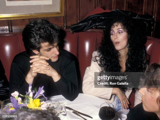 Singer/Actress Cher and boyfriend Rob Camilletti attend the 15th Annual American Music Awards After Party on January 25, 1988 at Chasen's Restaurant...