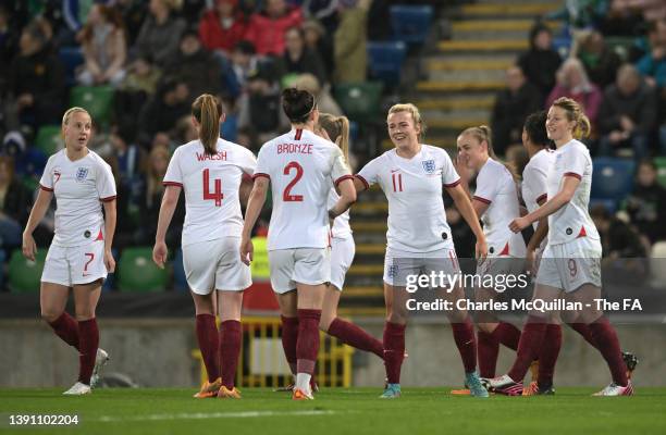 Lauren Hemp of England celebrates with teammates after scoring their team's first goal during the FIFA Women's World Cup 2023 Qualifier group D match...