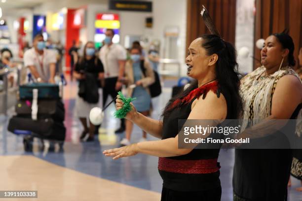 Maori cultural group welcomes tourists, friends and family to Auckland International Airport on April 13, 2022 in Auckland, New Zealand. New Zealand...