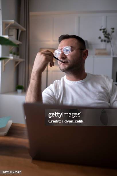 unhealthy stressed businessman - bokeh computer screen stock pictures, royalty-free photos & images