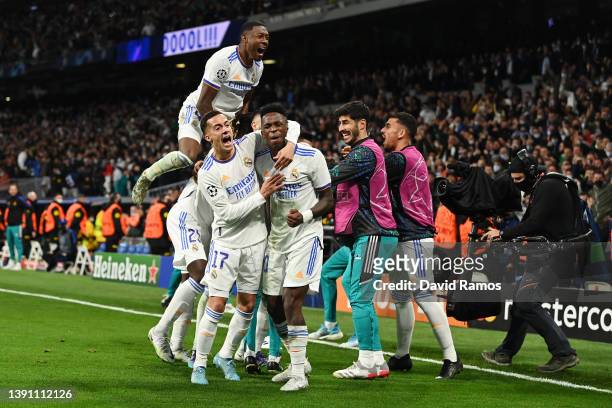 Lucas Vazquez and Vinicius Junior celebrate after Karim Benzema of Real Madrid scored their sides second goal during the UEFA Champions League...