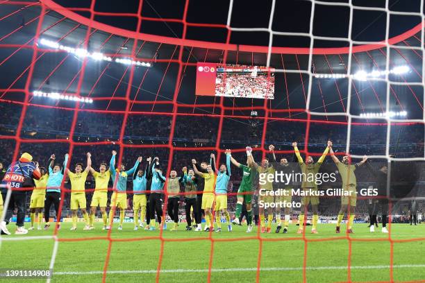 The team of Villareal celebrates the victory with their fans after the UEFA Champions League Quarter Final Leg Two match between Bayern München and...