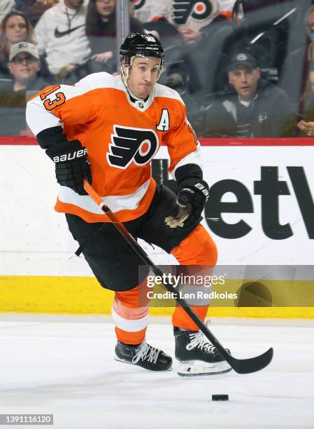Kevin Hayes of the Philadelphia Flyers skates the puck against the Columbus Blue Jackets at the Wells Fargo Center on April 5, 2022 in Philadelphia,...