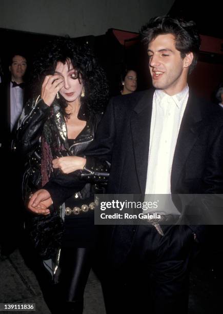 Singer/Actress Cher and boyfriend Rob Camilletti attend the "Scrooged" Hollywood Premiere on November 7, 1988 at Mann's Chinese Theatre in Hollywood,...