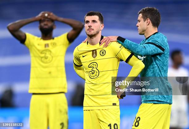 Mason Mount of Chelsea is consoled by team mate Cesar Azpilicueta after the UEFA Champions League Quarter Final Leg Two match between Real Madrid and...