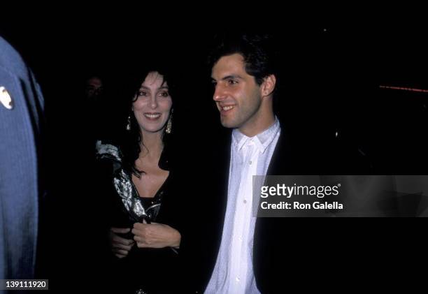 Singer/Actress Cher and boyfriend Rob Camilletti attend the "Scrooged" Hollywood Premiere on November 7, 1988 at Mann's Chinese Theatre in Hollywood,...