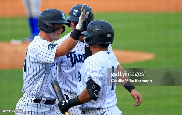 Grant Richardson of the Tampa Tarpons celebrates a two run home run in the second inning during a game against the Dunedin Blue Jays at George M....