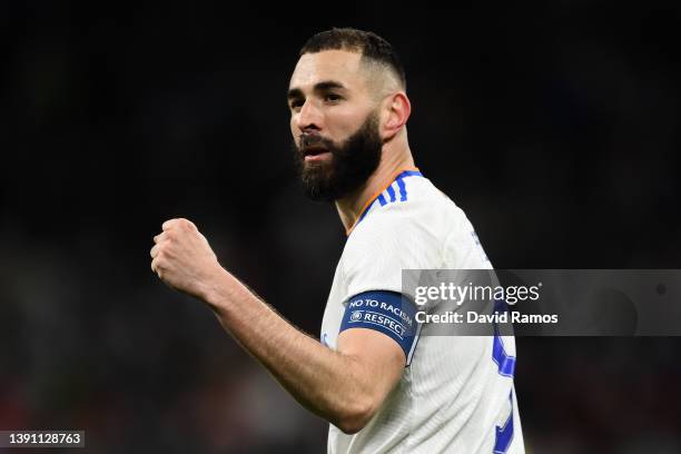 Karim Benzema of Real Madrid celebrates after scoring their team's second goal during the UEFA Champions League Quarter Final Leg Two match between...