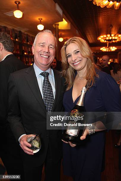 Dave Davis, President of ABC NY and Donatella Arpaia hold a celeration bottle of Martini during The Donatella Arpaia and MARTINI Host Rachael Ray's...