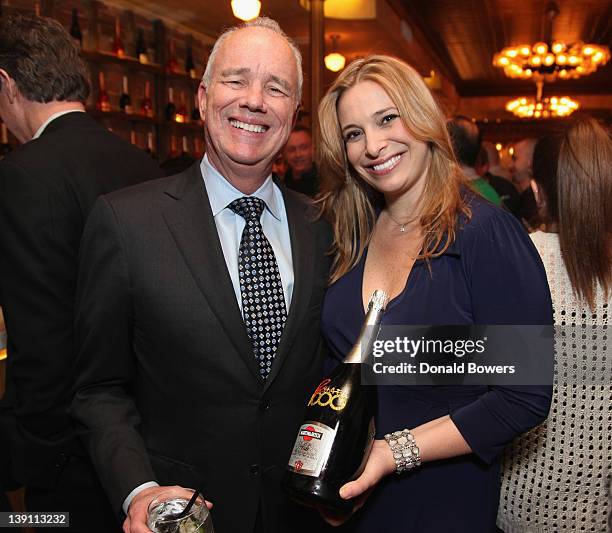 Dave Davis, President of ABC NY and Donatella Arpaia hold a celeration bottle of Martini during The Donatella Arpaia and MARTINI Host Rachael Ray's...