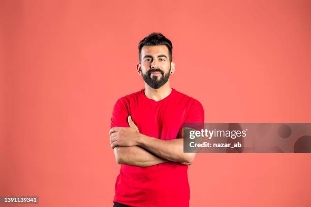 convinced and confident man with arms crossed looking to camera. - blank t-shirt model stock pictures, royalty-free photos & images