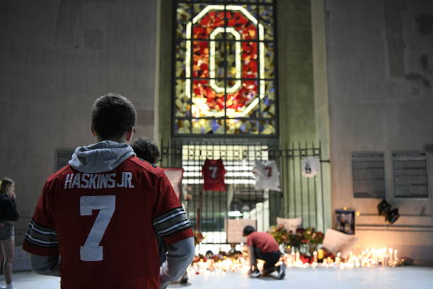Fans and students hold a candlelight vigil at Ohio Stadium in memory of Dwayne Haskins on April 12, 2022 in Columbus, Ohio. Pittsburgh Steelers...