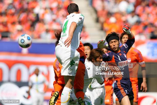 Eddy Bosnar of JEF United Chiba heads to score his side's first goal during the J.League J1 match between Albirex Niigata and JEF United Chiba at...
