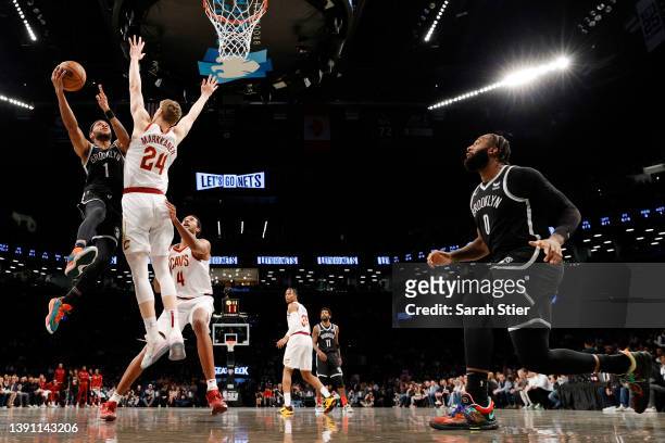 Bruce Brown of the Brooklyn Nets goes to the basket as Lauri Markkanen of the Cleveland Cavaliers defends during the Eastern Conference 2022 Play-In...